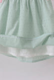 Green swiss dot cross sheep ruffle dress