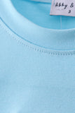 Blue cross applique top