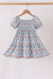 Blue floral smocked ruffle dress
