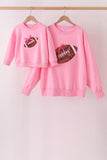 Pink football sequin mom&me top