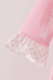 Pink skeleton print ruffle romper