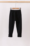 Black icing ruffle pants