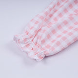 Pink gingerbread hand smocked gingham ruffle bubble