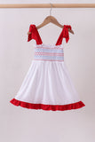 White smocked jacquard ruffle dress