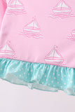 Pink sailboat print ruffle rashguard set
