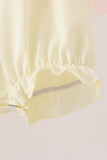 Cream smocked bow bubble