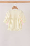 Cream smocked bow bubble