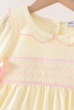 Cream smocked bow dress